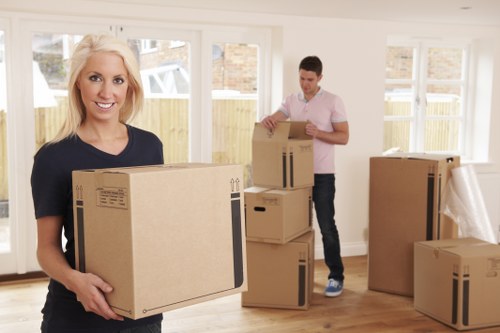 Local removals team handling furniture in Barnet