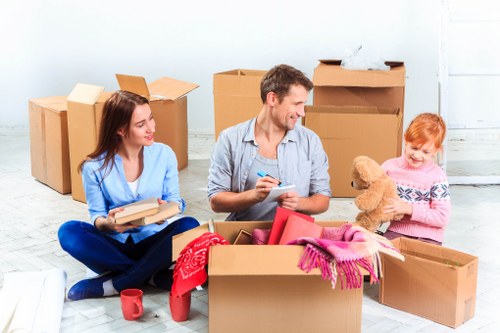 Barnet Man And Van team handling items safely during a move