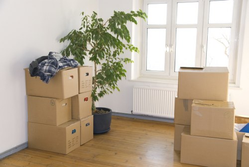 Local moving team loading furniture for a Barnet house move