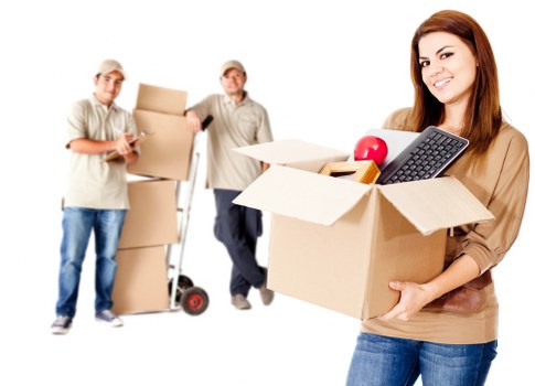 Furniture and boxes being transported by moving truck in Barnet