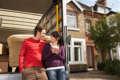Furniture being carefully moved into a Barnet property