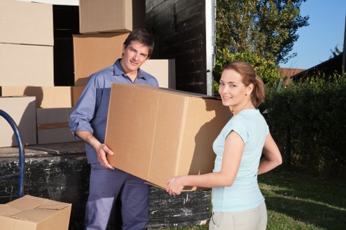 Careful lifting of furniture during a Barnet house move