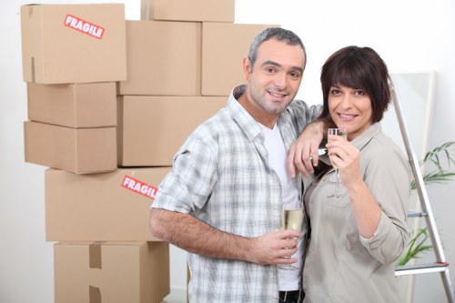 Loading furniture into a moving van in Barnet